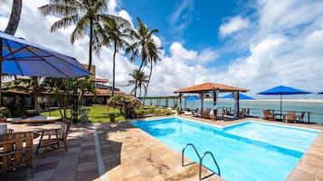 Outdoor pool, pool umbrellas, sun loungers