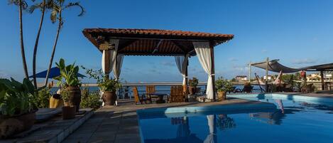 Outdoor pool, pool umbrellas, pool loungers