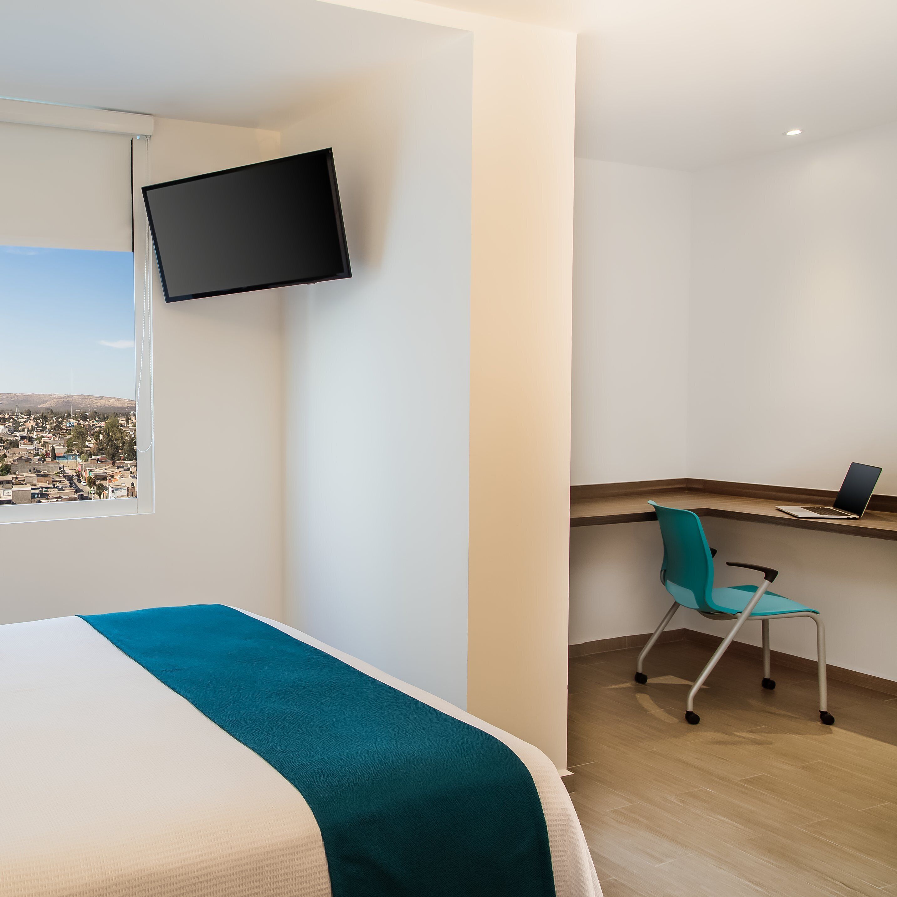 hypo-allergenic bedding, down duvets, in-room safe, desk