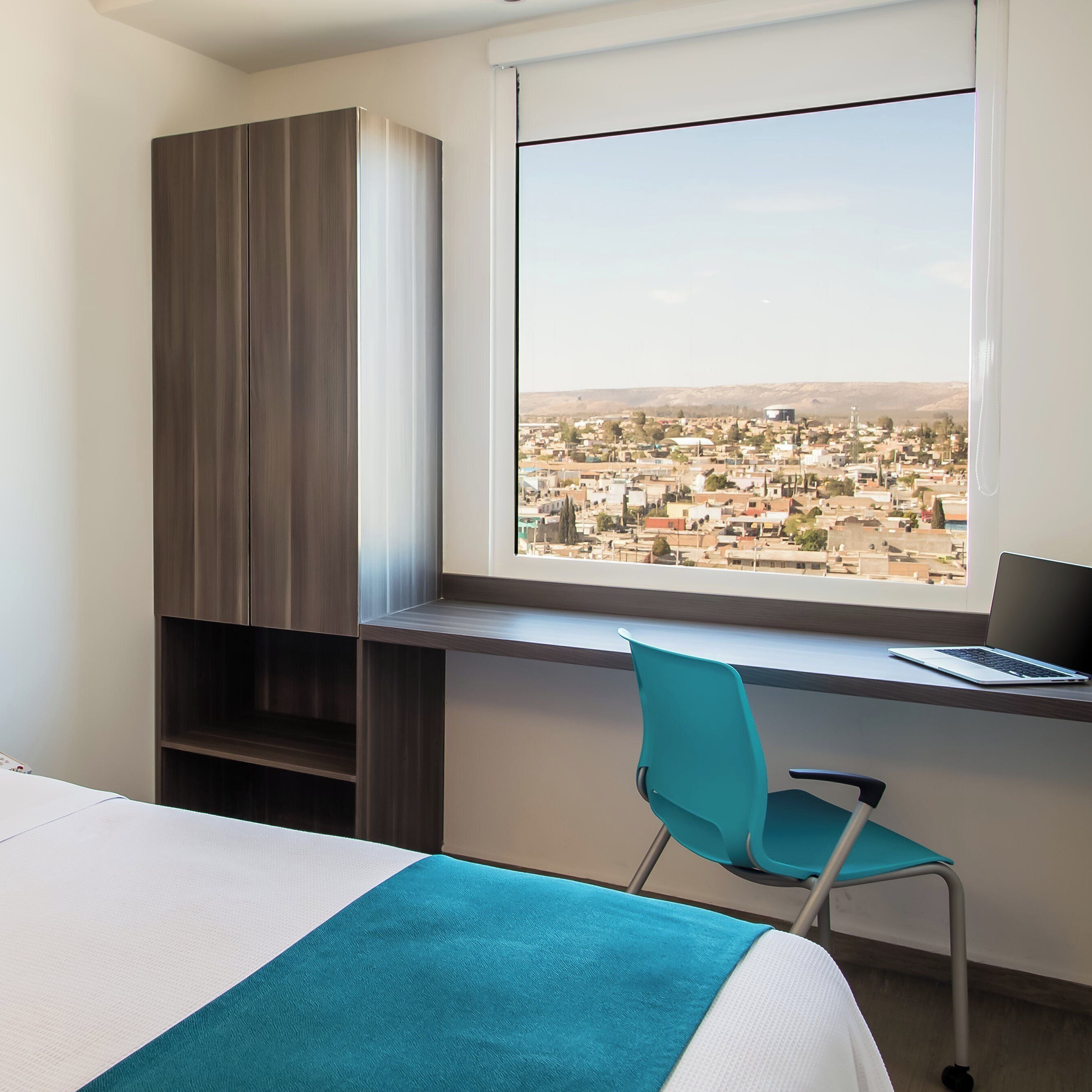 Hypo-allergenic bedding, down comforters, in-room safe, desk