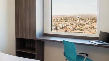 Hypo-allergenic bedding, down comforters, in-room safe, desk