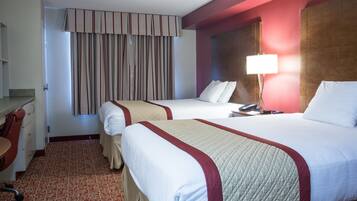 Suite, 2 Queen Beds | Desk, iron/ironing board, rollaway beds, free WiFi