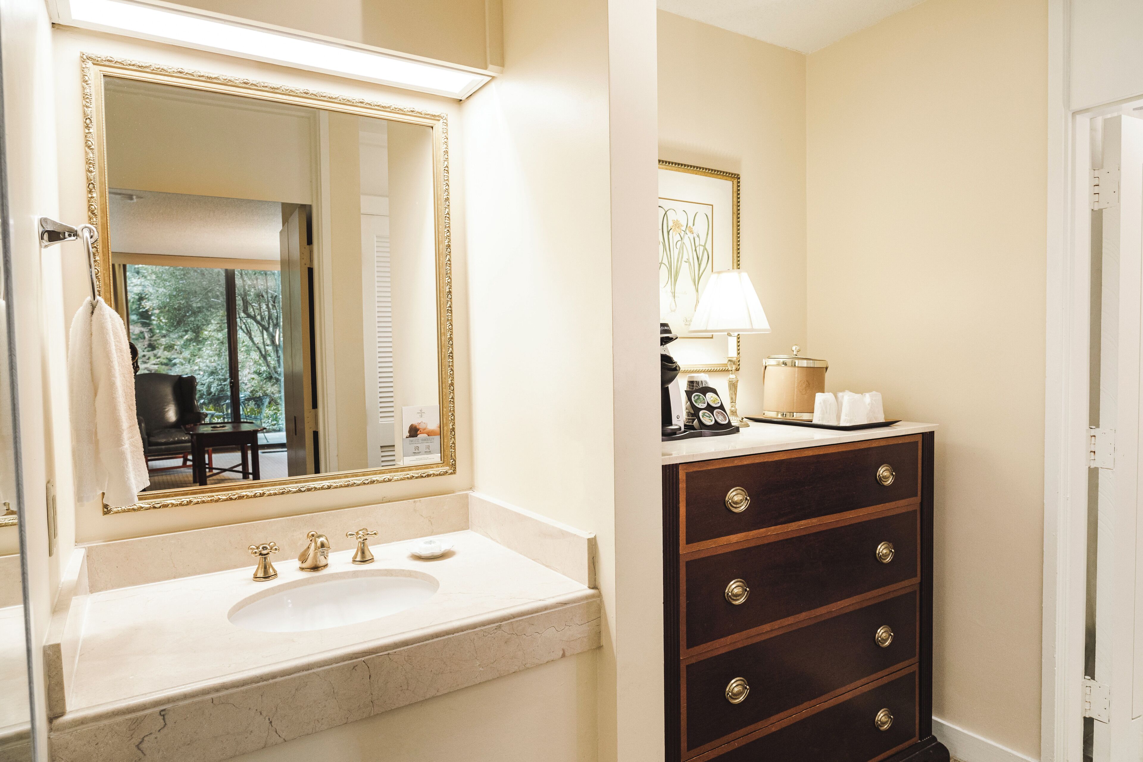 combined shower/bathtub, designer toiletries, hair dryer, towels