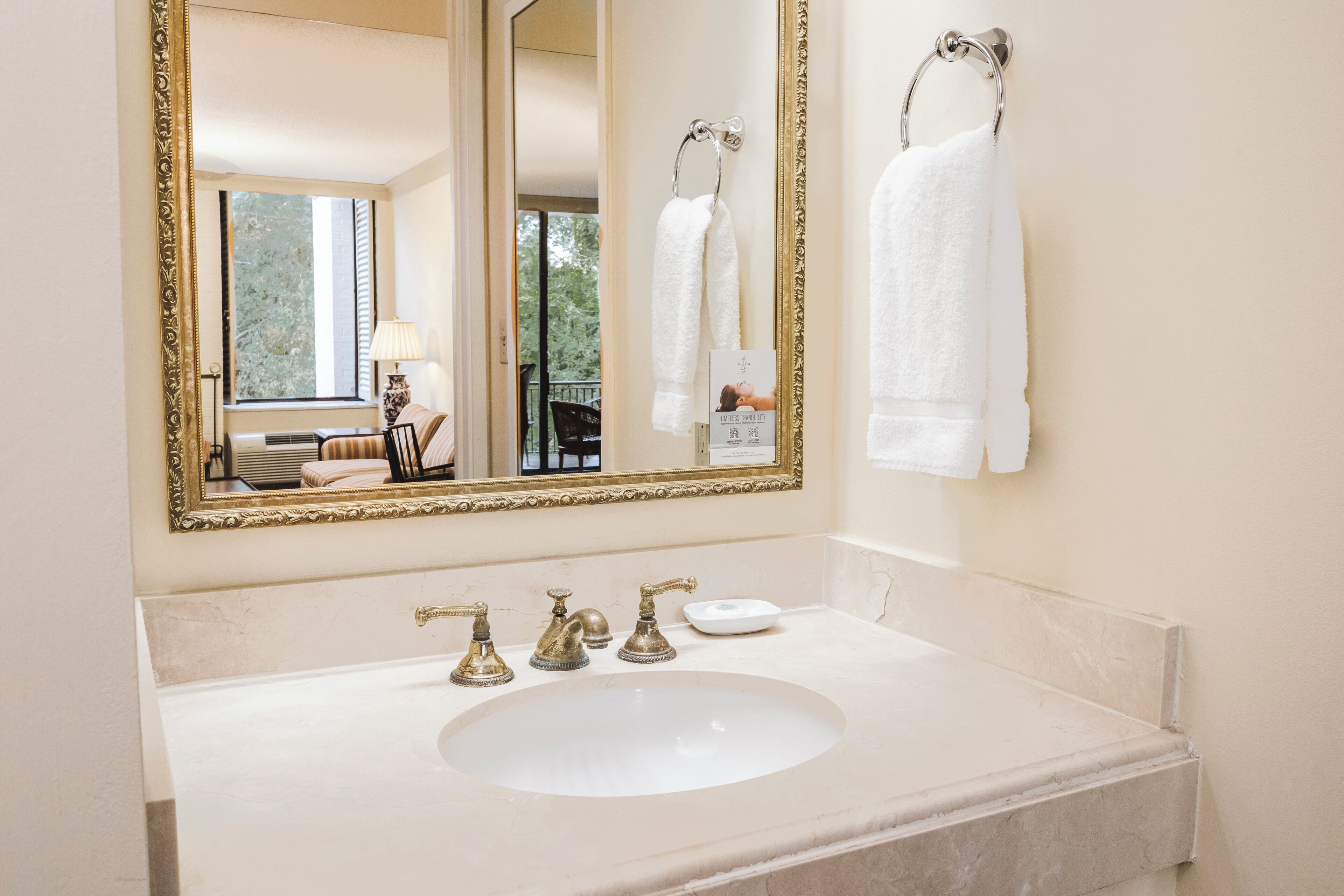 combined shower/bathtub, designer toiletries, hair dryer, towels