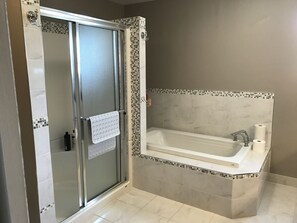 Deep-soaking bathtub, free toiletries, hair dryer, bathrobes