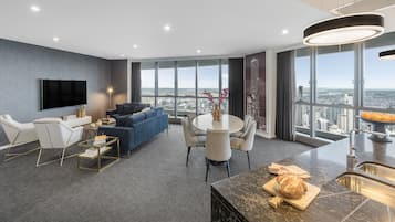 3 Bedroom Parkland Penthouse | Living area | Flat-screen TV