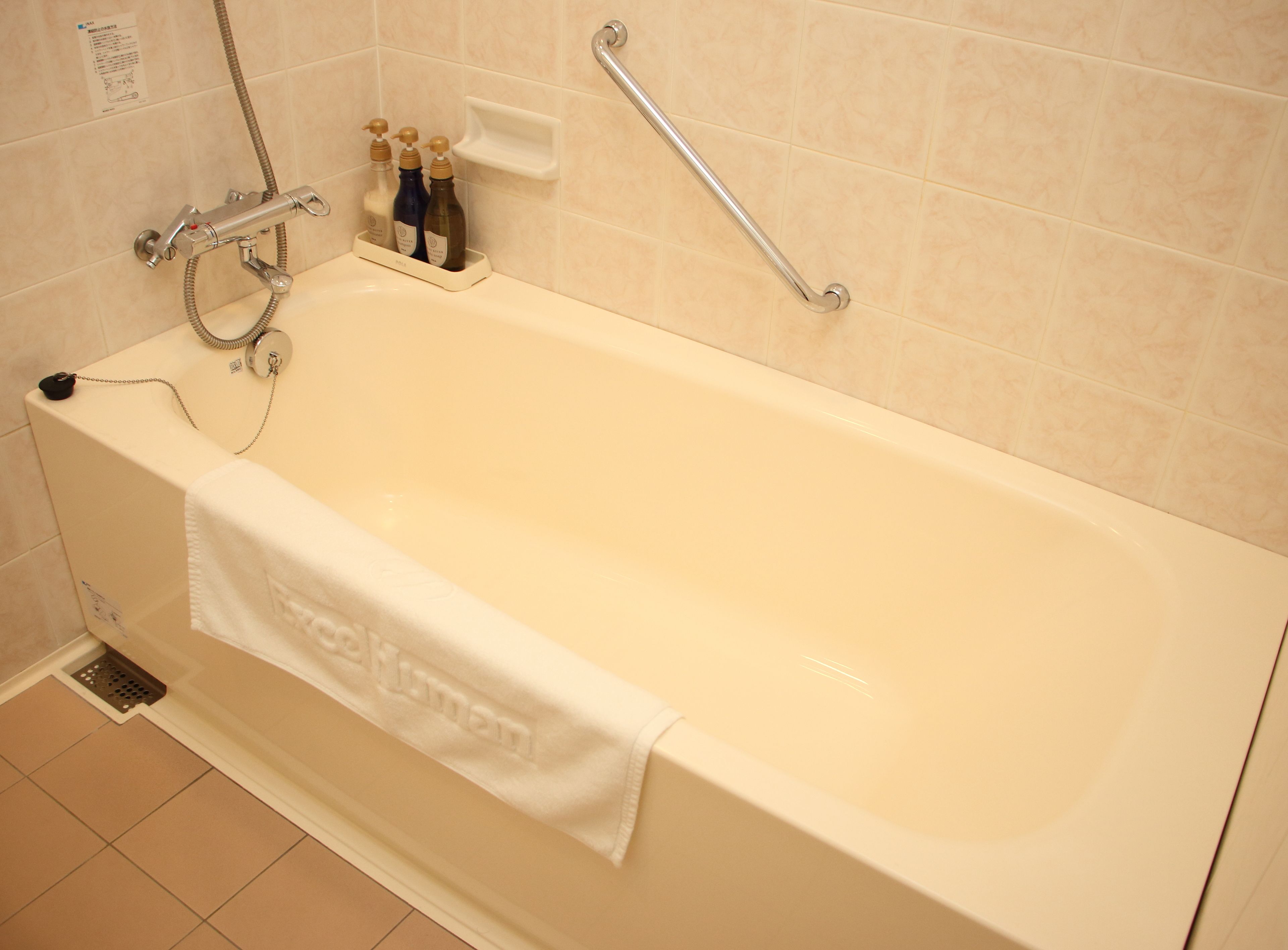 deep-soaking bathtub, free toiletries, hair dryer, slippers