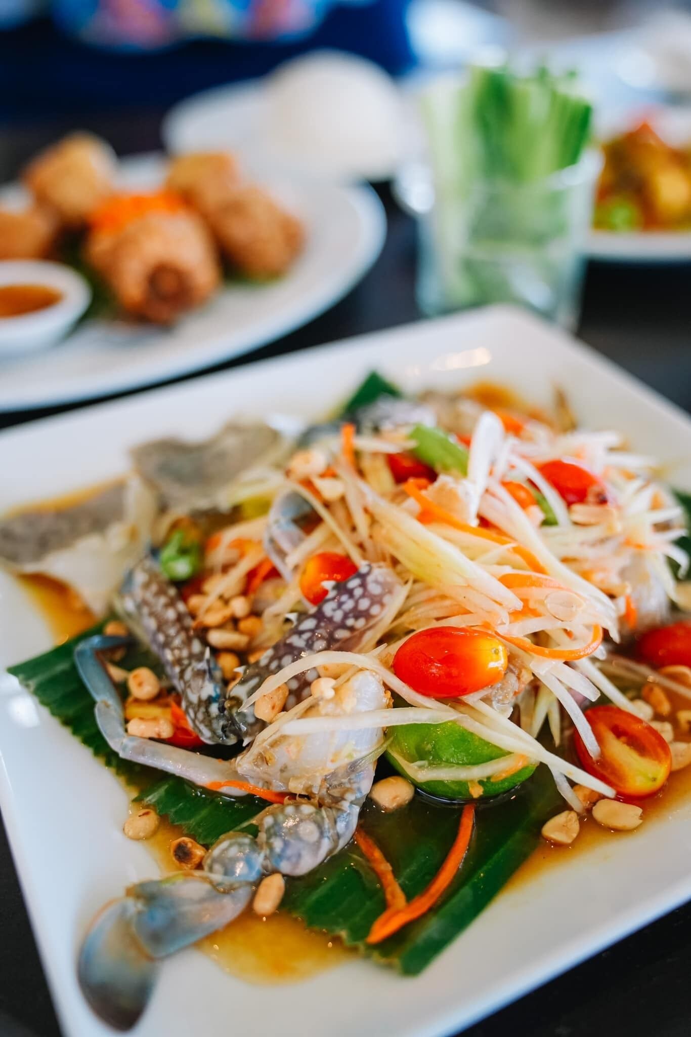 A plate of food with seafood and vegetables.