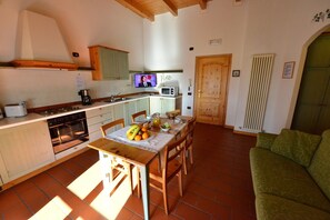 Apartment, 1 Bedroom | Living area | Flat-screen TV - Residence La Colombera (Riva del Garda)