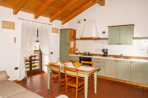 Apartment, 1 Bedroom | Living area | Flat-screen TV - Residence La Colombera (Riva del Garda)