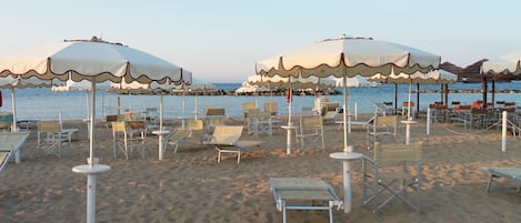 Private beach nearby, white sand, sun loungers, beach umbrellas