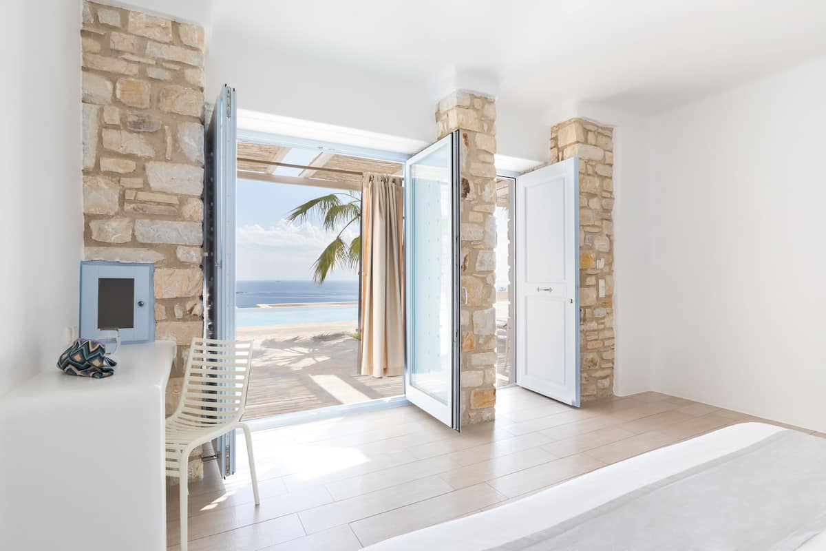 junior suite with sea view | 1 bedroom, premium bedding, minibar, in-room safe