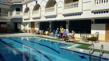 Outdoor pool, pool umbrellas, pool loungers