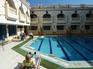 Outdoor pool, pool umbrellas, pool loungers