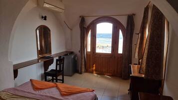 Quarto panorâmico, vista para o oceano | Roupa de cama