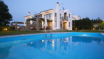 Outdoor pool, pool umbrellas, pool loungers