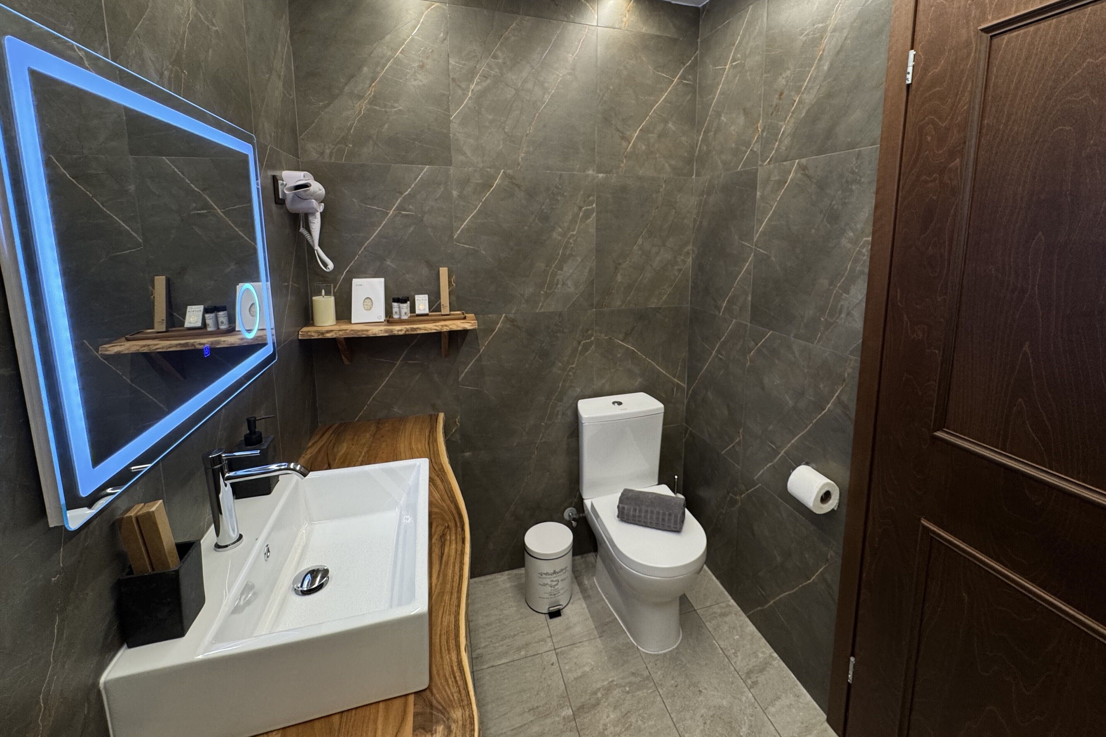 shower, rainfall showerhead, hair dryer, towels