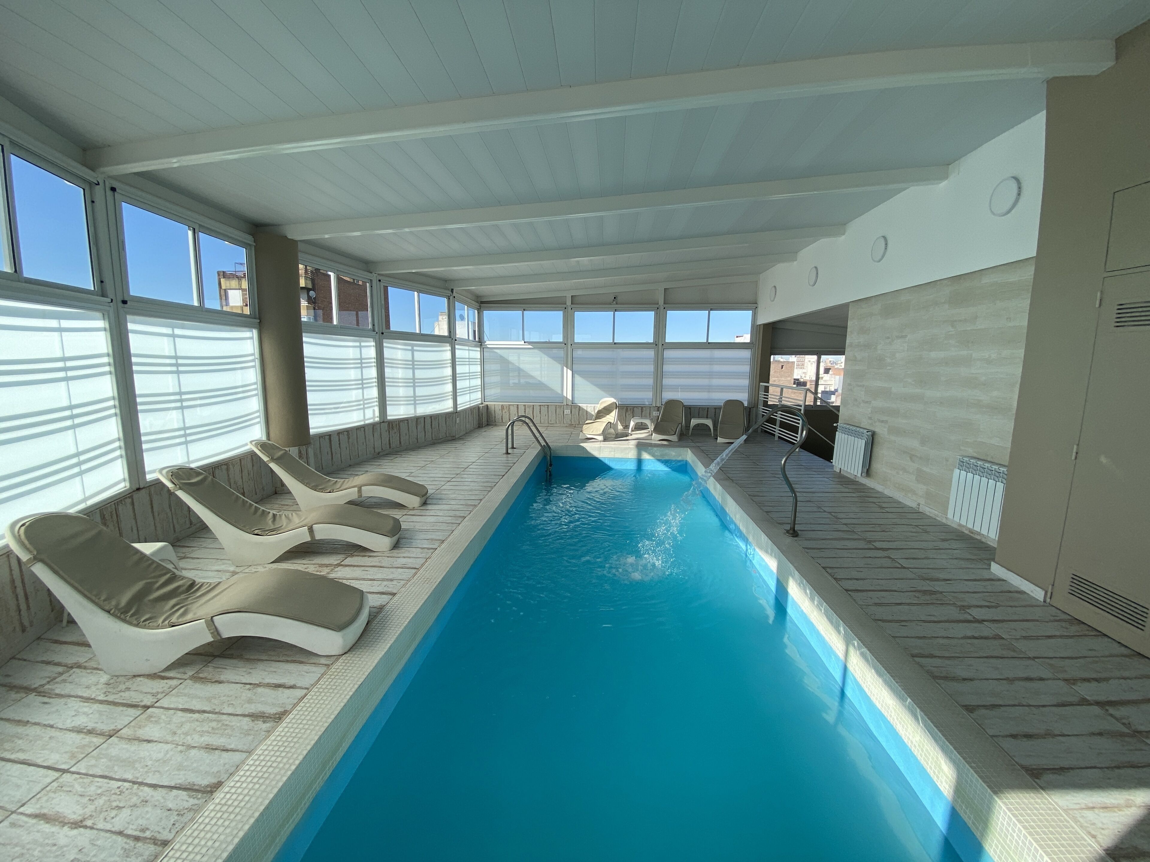 Indoor pool, outdoor pool, open 9:00 AM to 8:00 PM, pool loungers