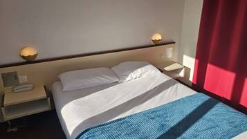 Desk, free WiFi, bed sheets