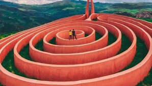 A large, red spiral maze with a central viewing platform and a bridge. - Heart of Sicily (Mistretta)