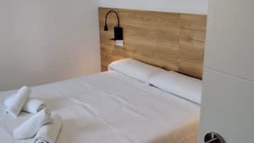 Apartamento, 1 cama de matrimonio con sofá cama | 1 dormitorio, cortinas opacas, wifi gratis y ropa de cama