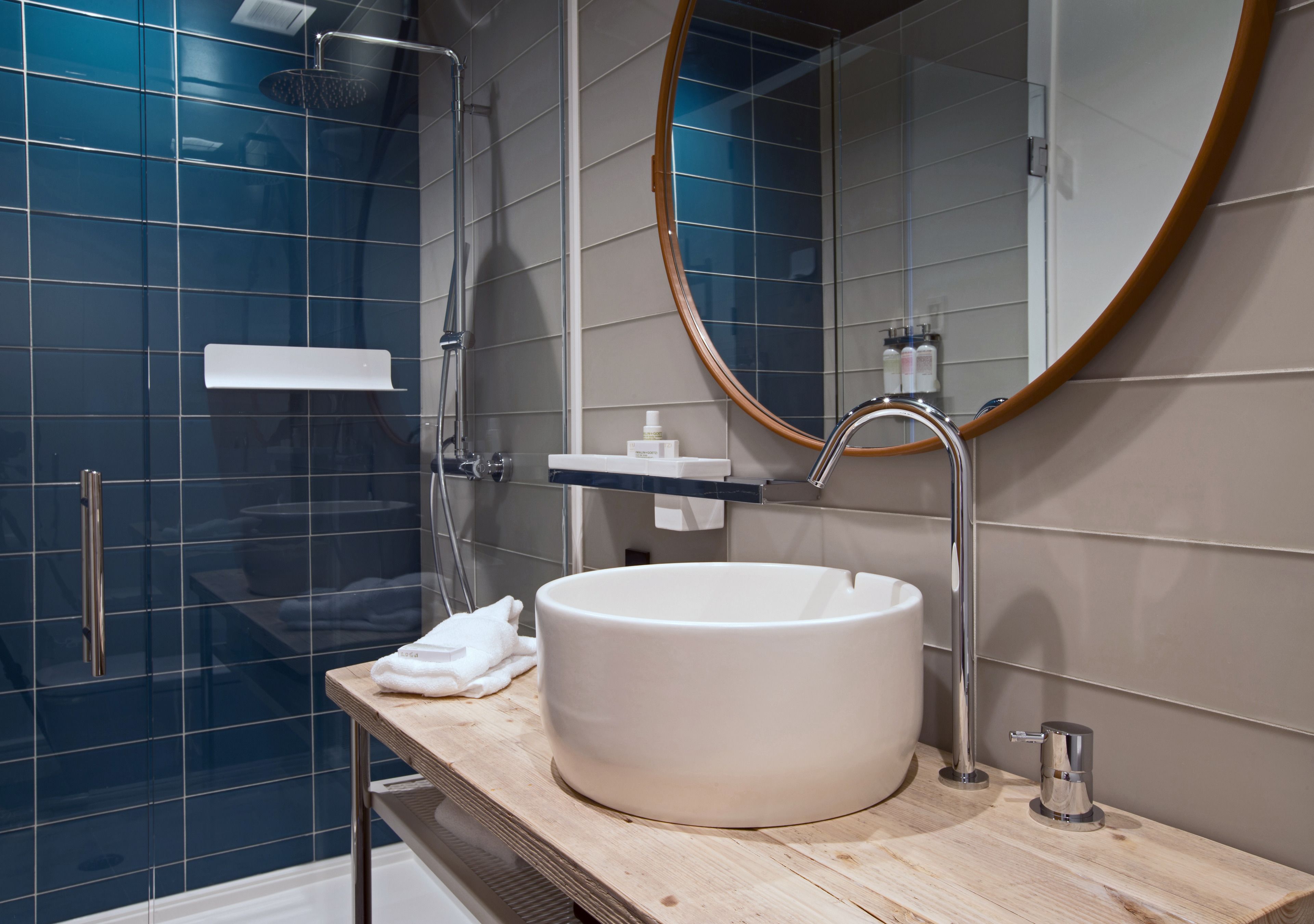 shower, rainfall showerhead, designer toiletries, hair dryer