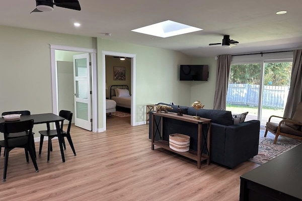 The Cottage, 2 Bedrooms | Living area | 32-inch TV with cable channels