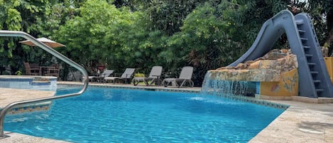 Outdoor pool, pool umbrellas, pool loungers