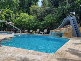 Outdoor pool, pool umbrellas, sun loungers