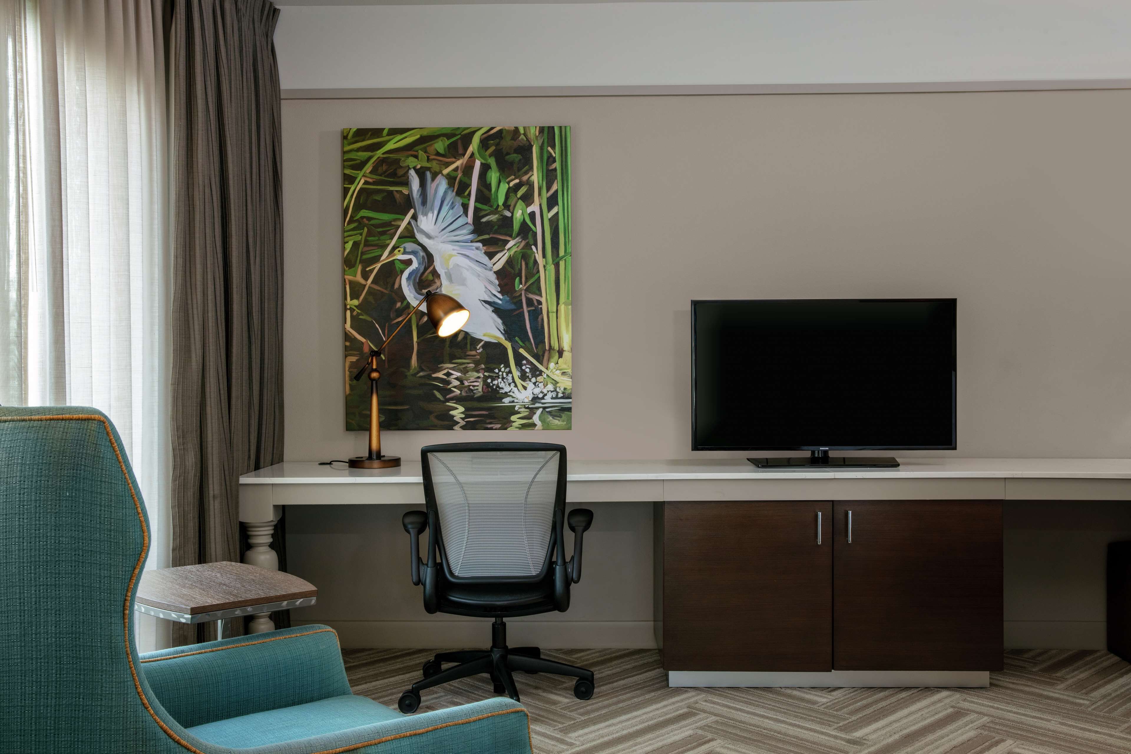 premium bedding, desk, laptop workspace, iron/ironing board