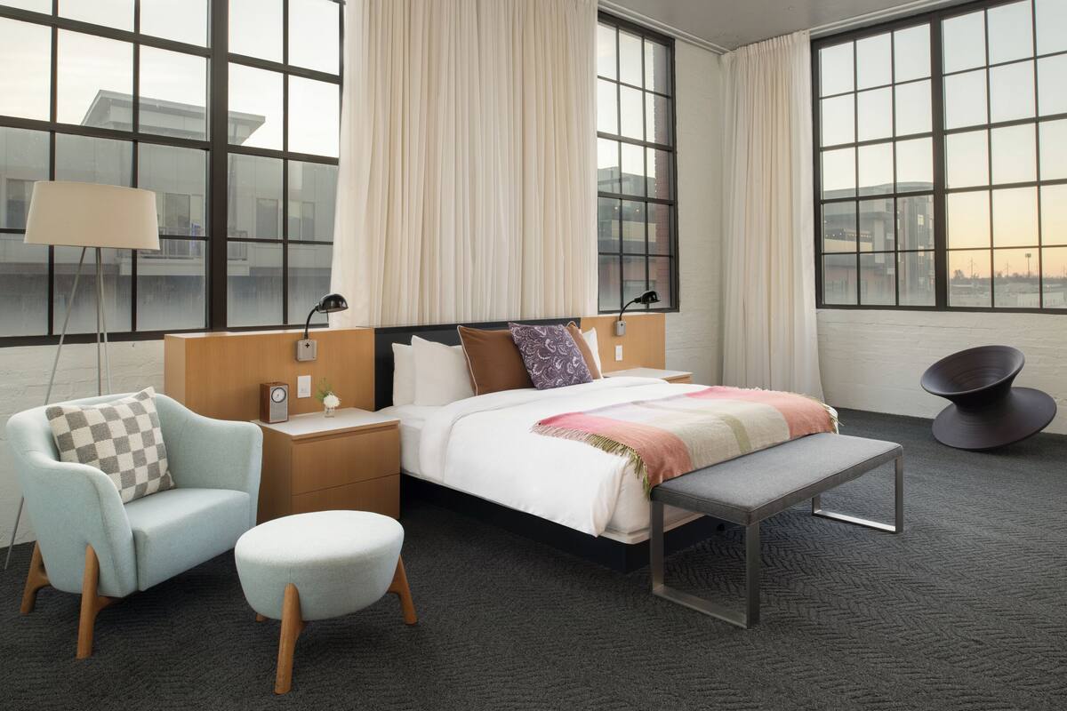 luxury suite, 1 king bed (loft) | premium bedding, down duvets, in-room safe, individually decorated