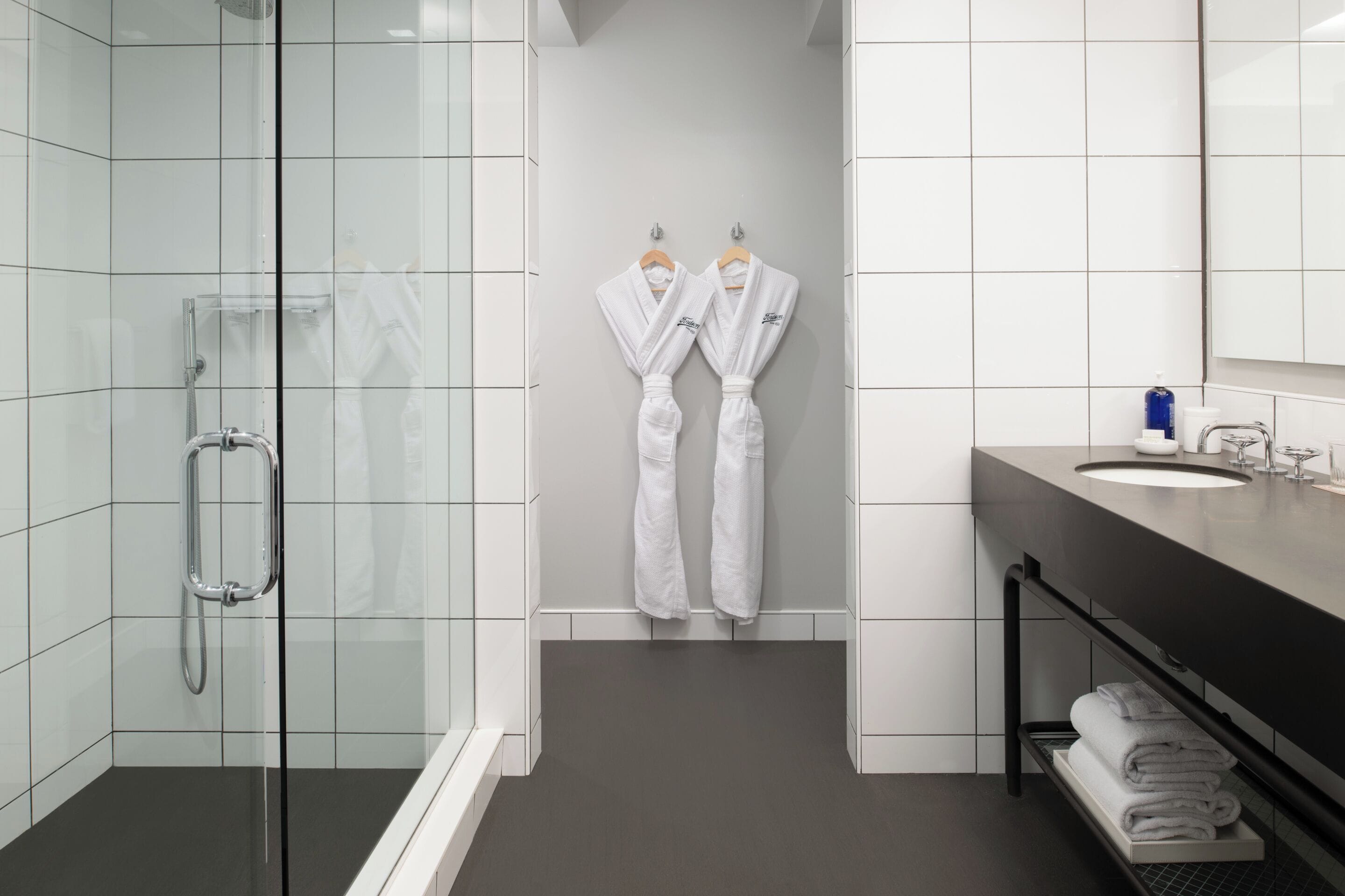 rainfall showerhead, designer toiletries, hair dryer, bathrobes