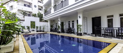 Outdoor pool, sun loungers