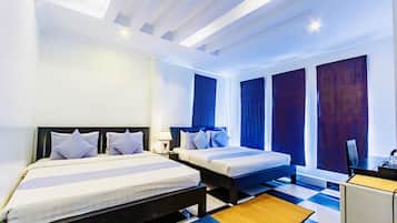 Deluxe Family Room | 1 bedroom, minibar, in-room safe, desk