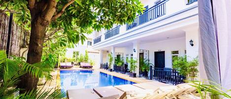Outdoor pool, sun loungers
