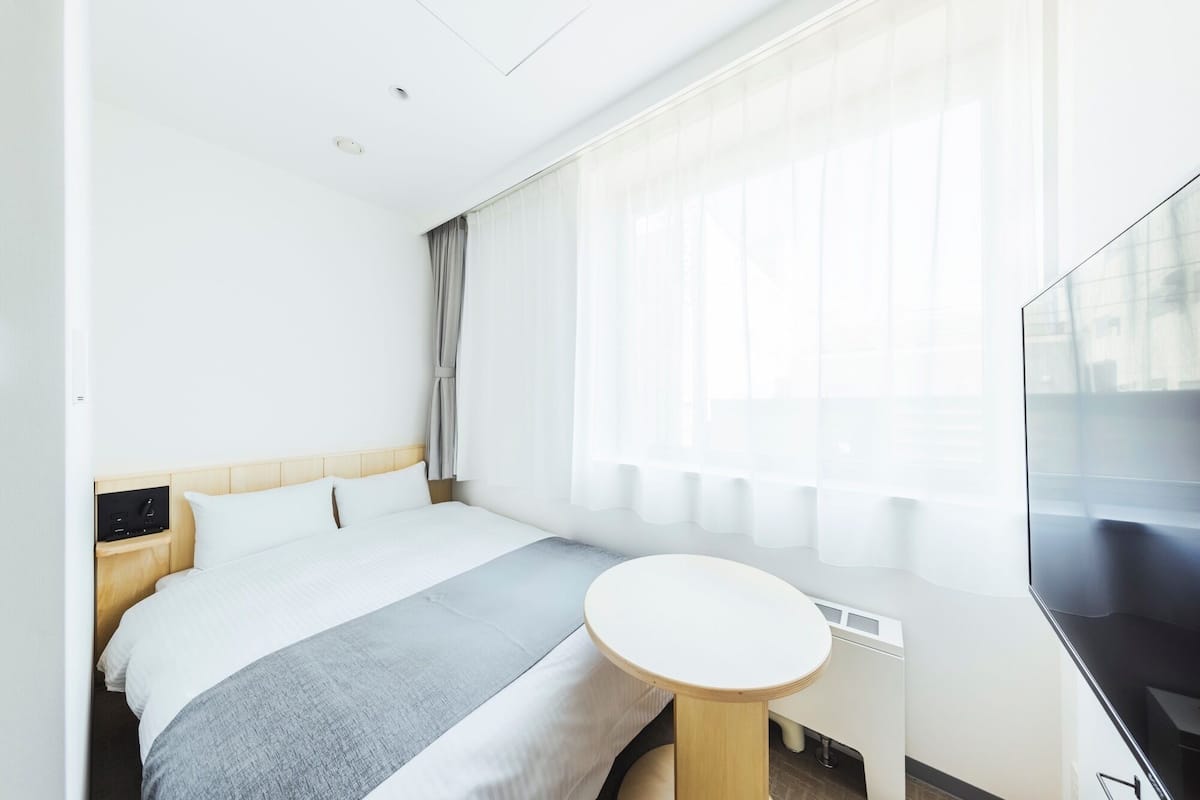 Chambre Double Économique, 1 grand lit 1 place, non-fumeurs, baignoire | Wi-Fi gratuit, draps fournis