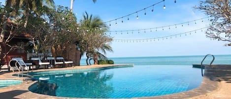 Outdoor pool, open 8:00 AM to 8:00 PM, sun loungers