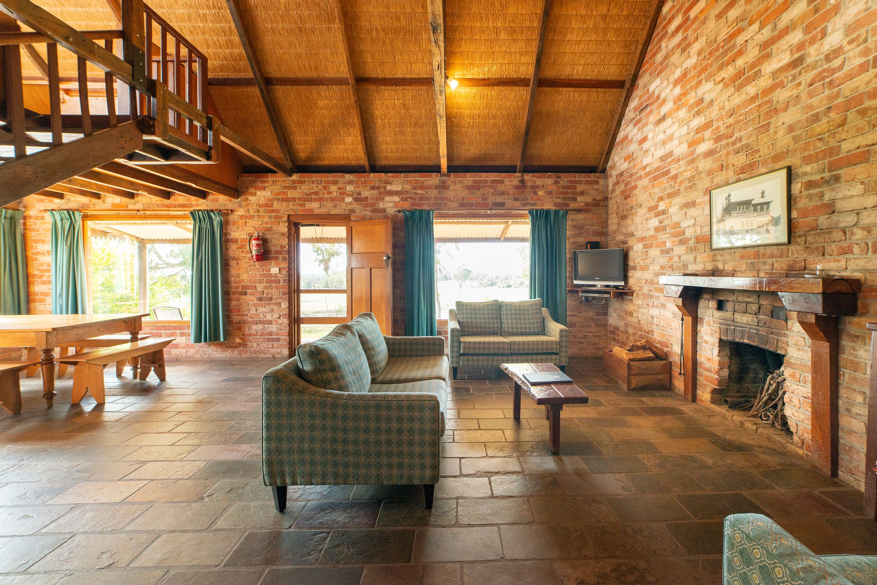 Redbrick Cottage | Living room | Flat-screen TV, fireplace, DVD player