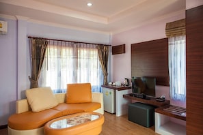 Grand Villa | Living area | 29-inch LCD TV with cable channels, TV