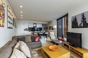 Flat-screen TV, DVD player, MP3 dock