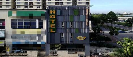 Welcome to SMILE Hotel, a contemporary hotel with a bold entrance.