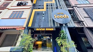 A hotel named "Hotel Seeds" with a modern facade, a prominent sign, and a visible entrance. - Seeds Hotel Setiawangsa (Ampang)