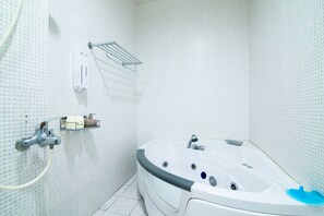 Shower, free toiletries, hair dryer, slippers