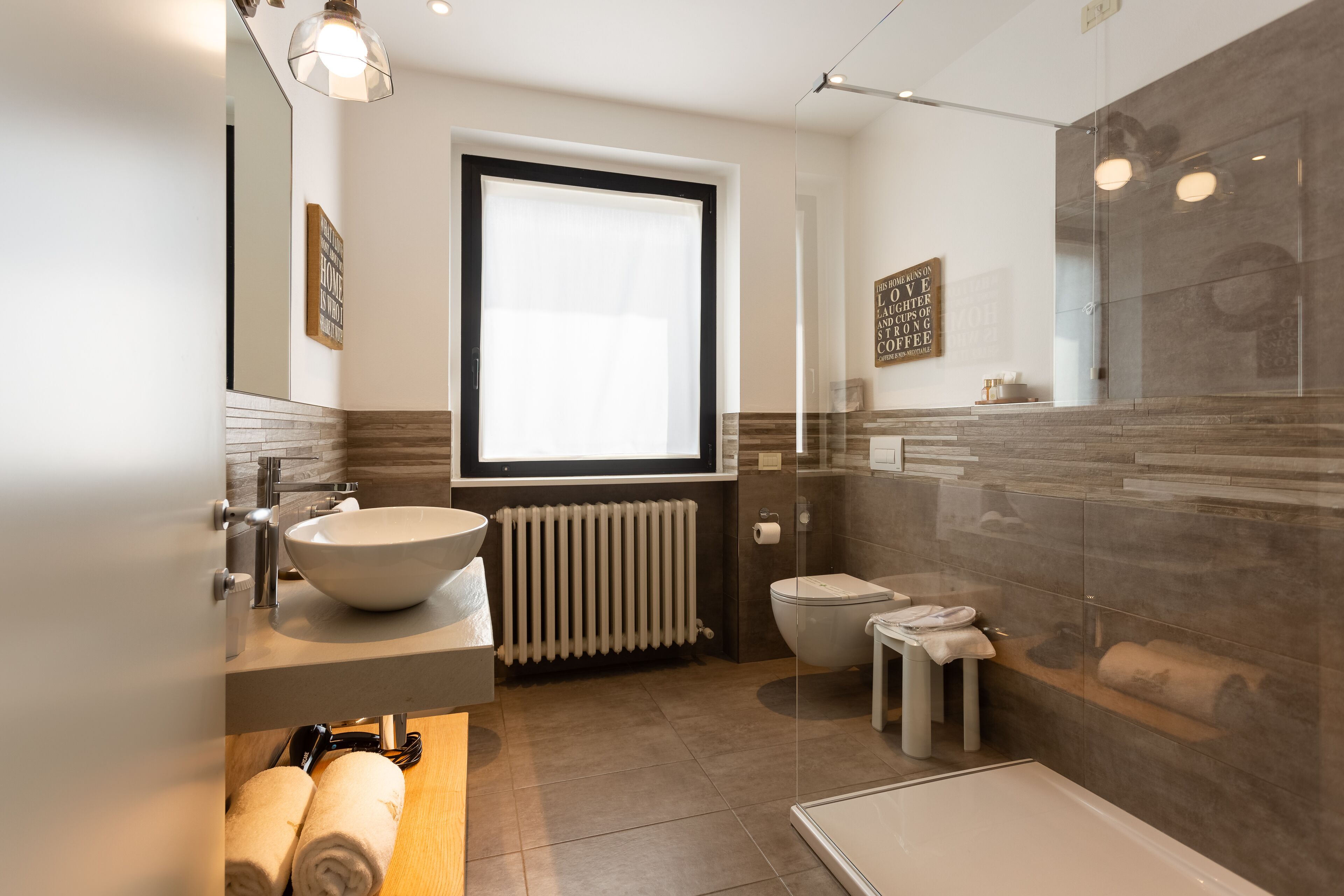 superior double room | bathroom | shower, rainfall showerhead, designer toiletries, hair dryer