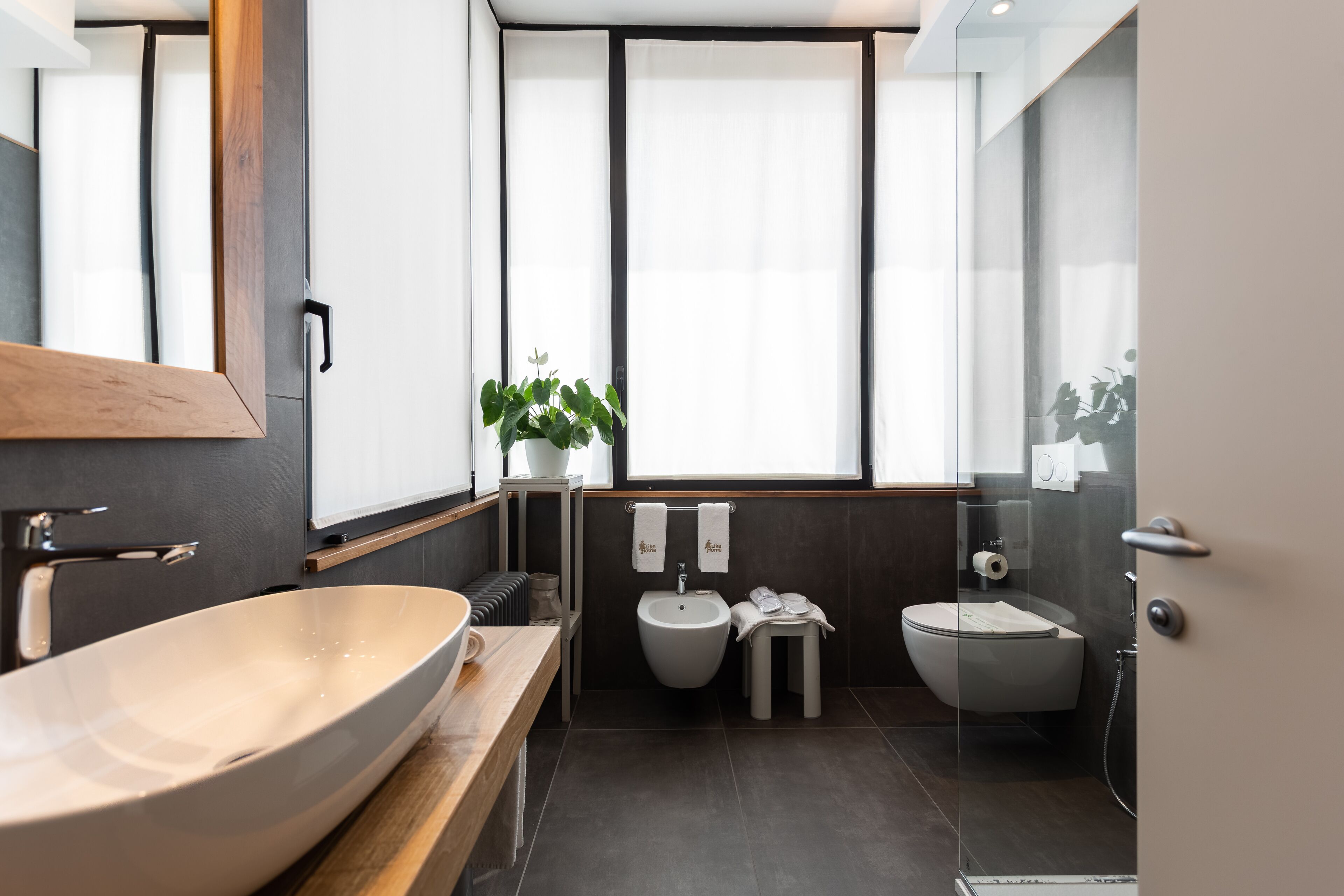 comfort double room | bathroom | shower, rainfall showerhead, designer toiletries, hair dryer