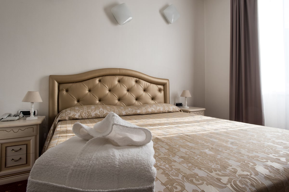 Standard Double or Twin Room | Minibar, in-room safe, desk, blackout drapes