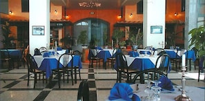 Breakfast, lunch, dinner served; Italian cuisine, beach views