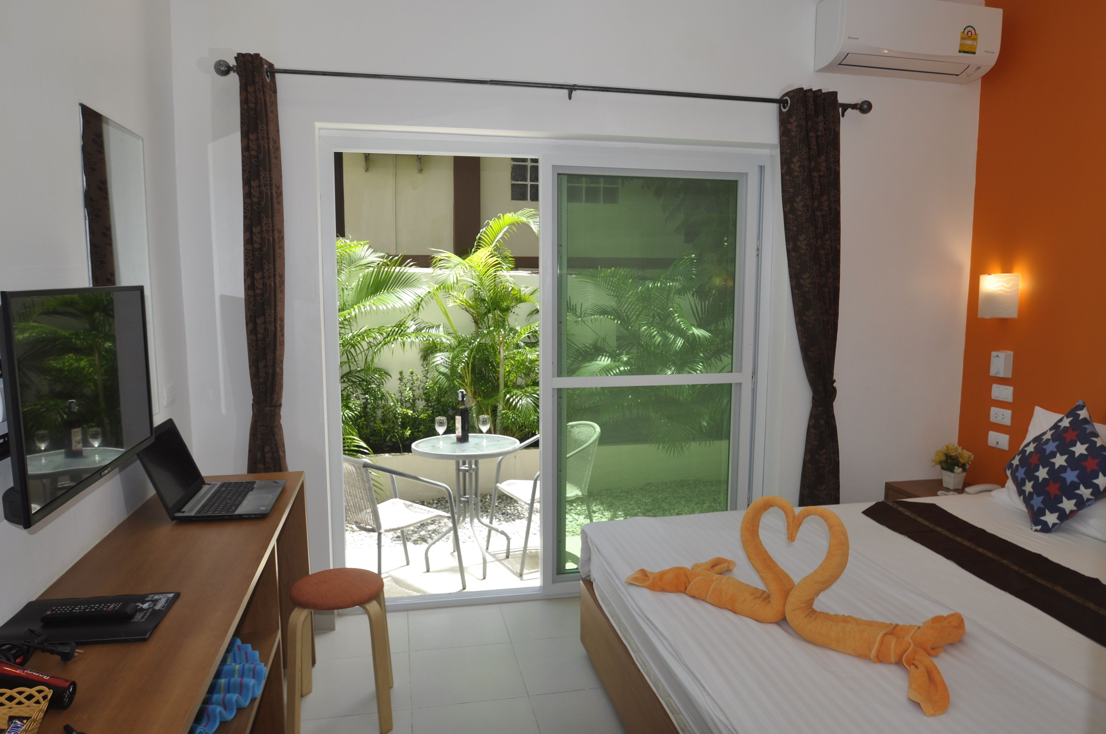 comfort double room, 1 king bed, non smoking, garden view | terrace/patio