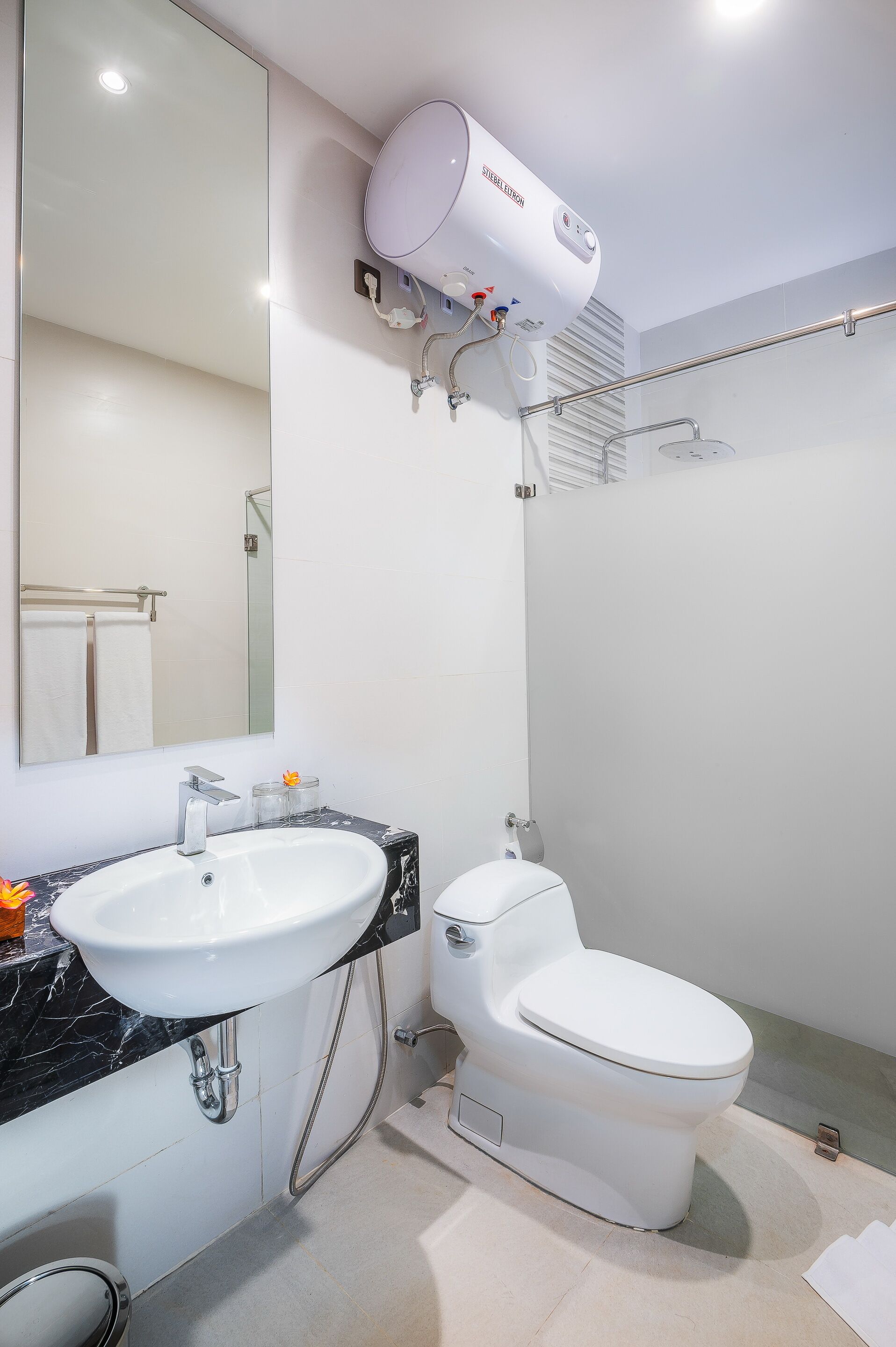 shower, free toiletries, hair dryer, slippers