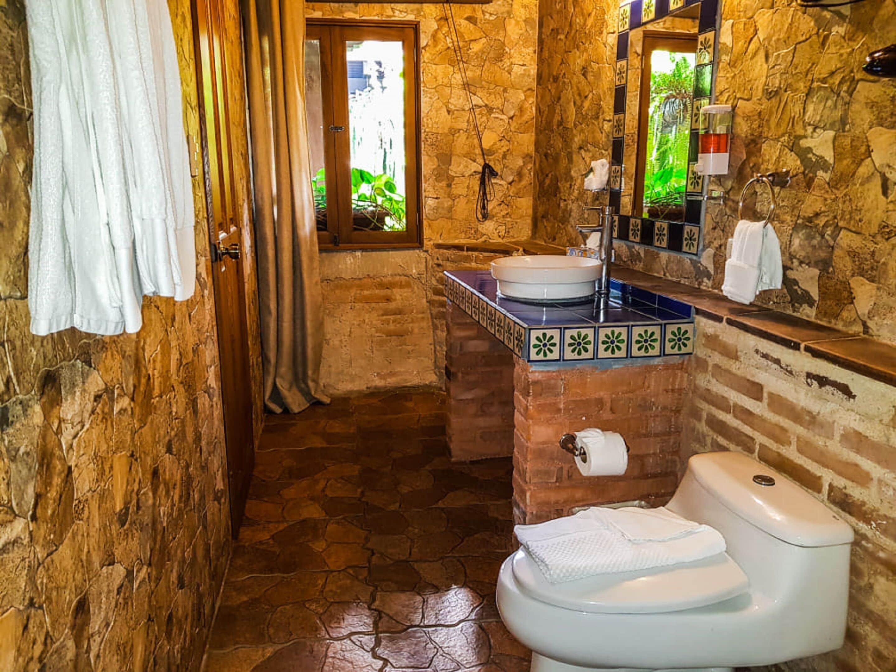 standard room, 3 queen beds | bathroom | shower, free toiletries, hair dryer, towels